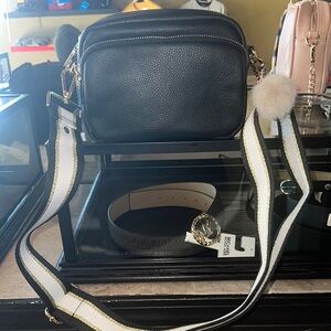 Black and Gold Crossbody Bag with Structured Design